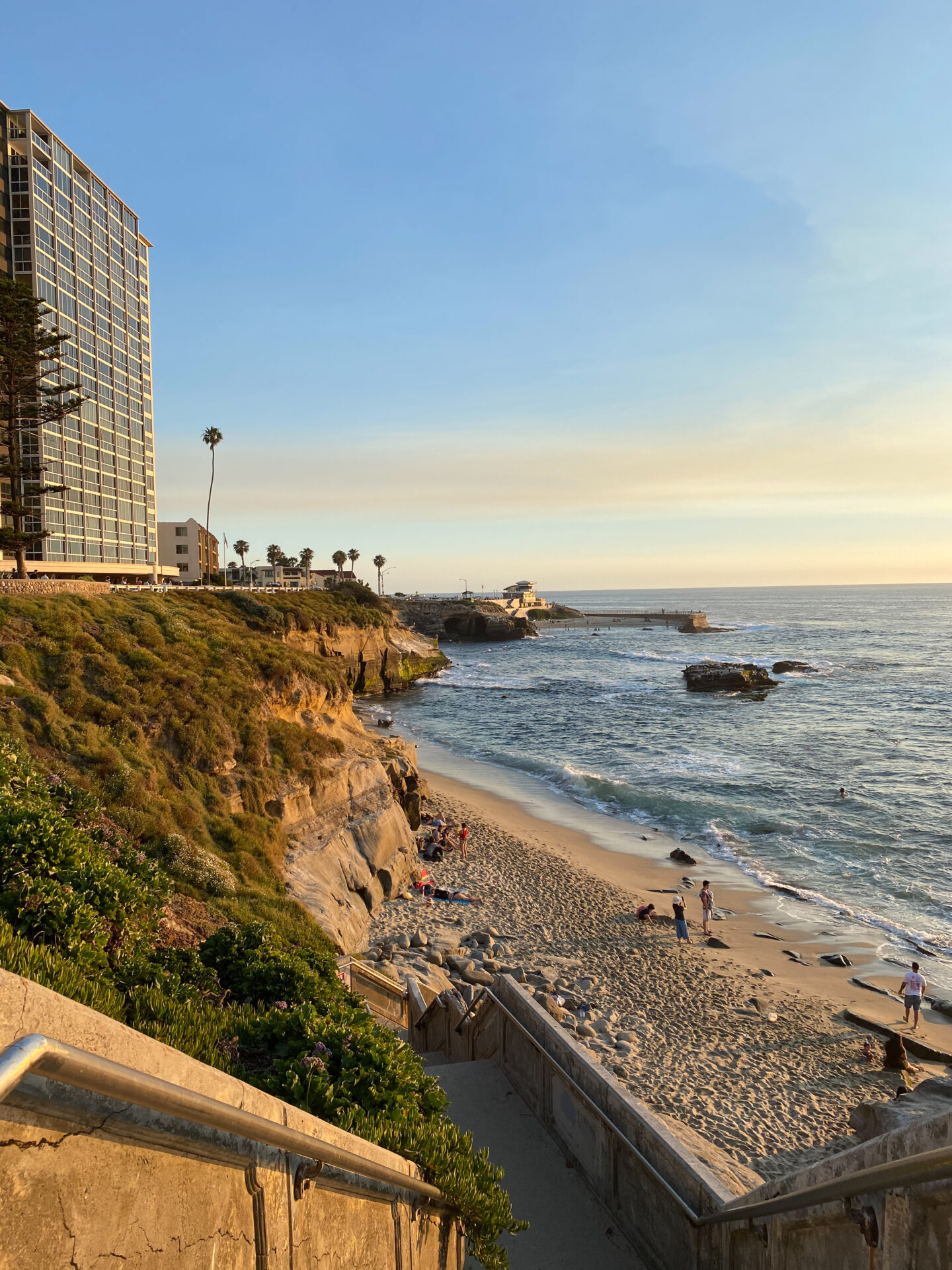 How to spend one day in San Diego itinerary - Palm Trees and Pellegrino San Diego and California travel tips - La Jolla cove beach view at sunset