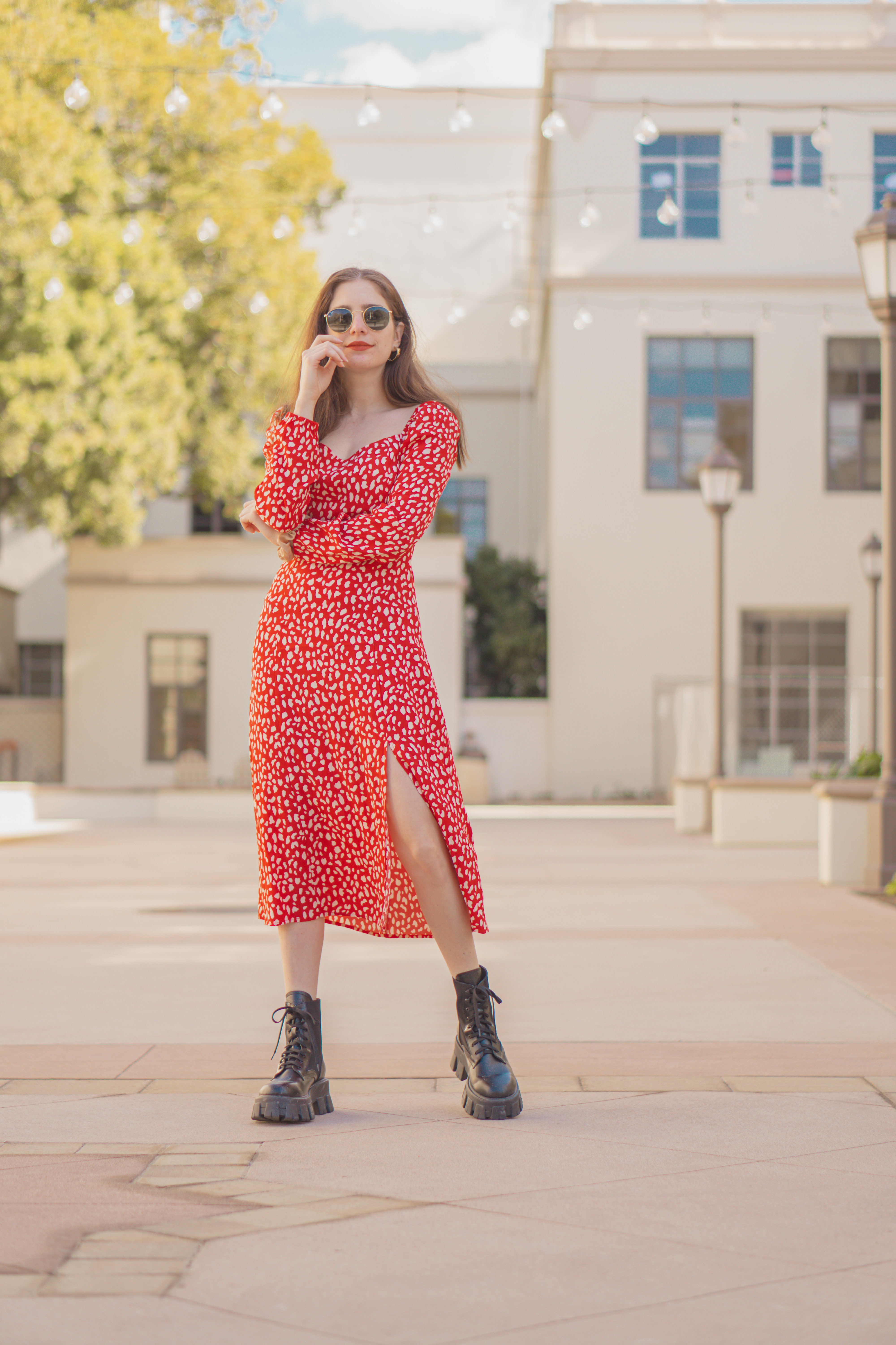 Valentine's Day Outfit Ideas for Women - Sweatheart neckline, slit dress with red and white polka dot pattern, combat boots outfit, how to style combat boots blogger outfit, blogger style