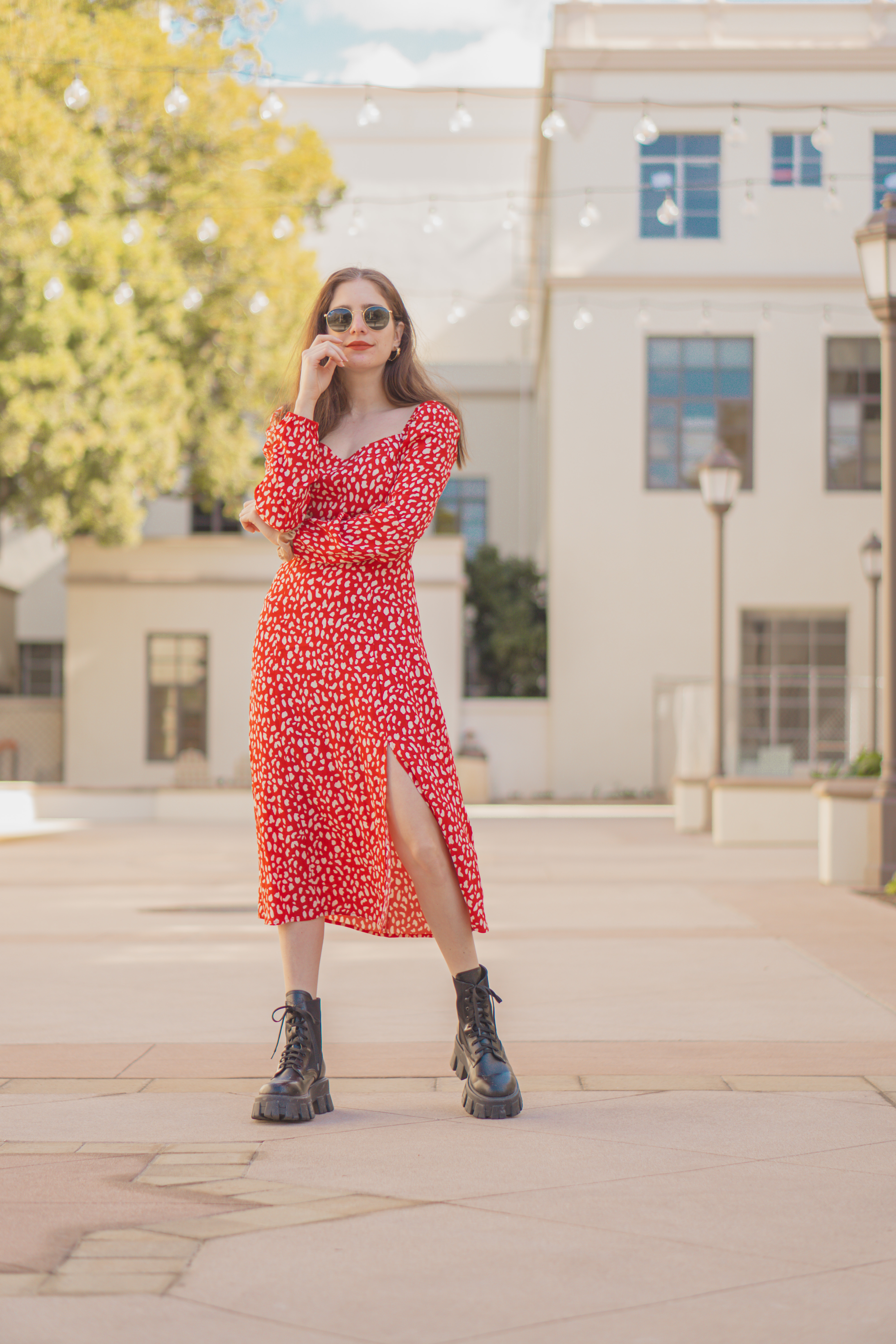 Edgy brunch outfit idea, slit leg sweetheart neckline spotted dress with black Prada combat boots  - Palm Trees and Pellegrino