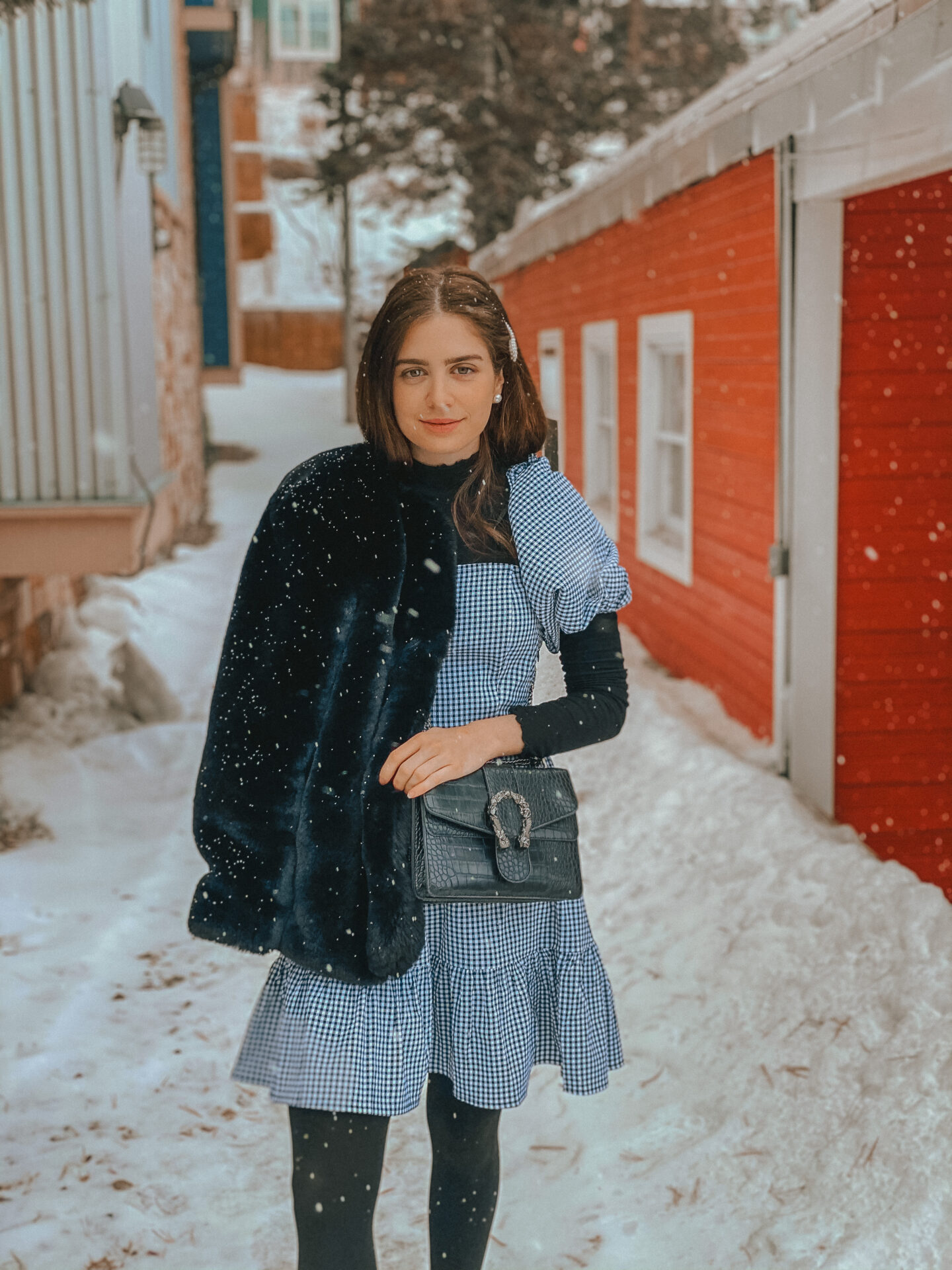 Valentine's Day Outfit Ideas for Women - Gingham balloon sleeve dress with black turtleneck, black faux fur coat, and black tights outfit