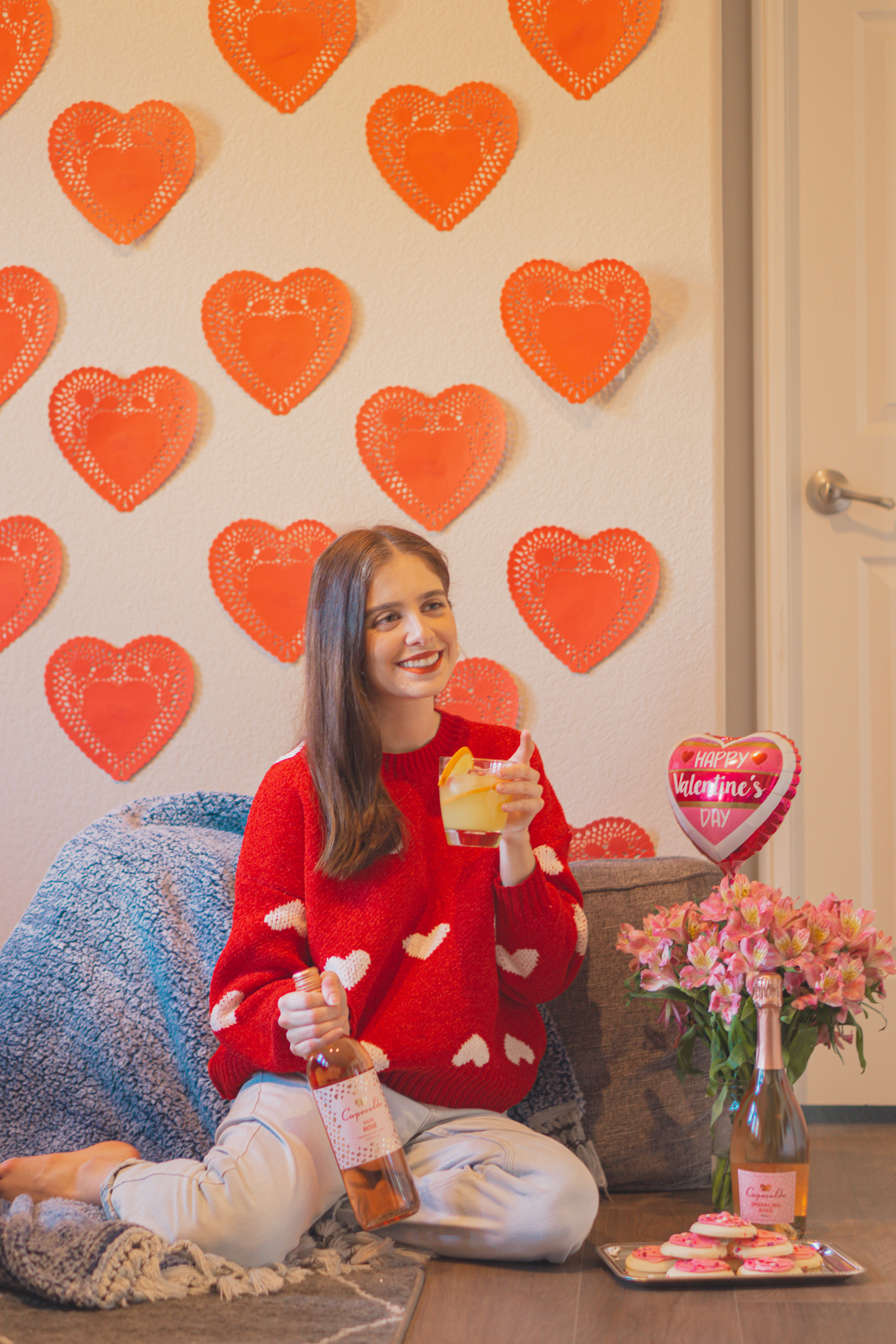 girl wearing Valentine's Day outfit, How to Host the Perfect Galentine's Day Party, Valentine's Day photoshoot ideas  - Palm Trees and Pellegrino San Diego blogger